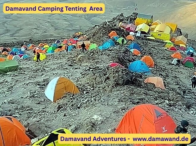 Tenting area at Mount Damavand campsite with tents set up in the mountainous landscape